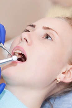 AA young girl at her dental appointment.