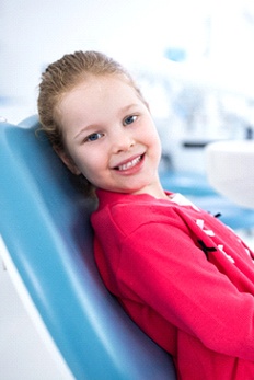 Young girl in dental chair for mouthguard