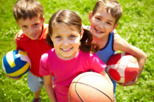 three children smiling