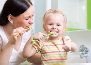 toddler brushing teeth