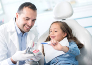 young girl at dentist