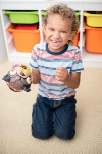 Boy with missing tooth at pediatric dentist in Northampton