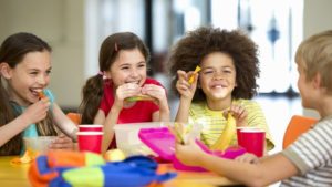 Children eating lunch at school